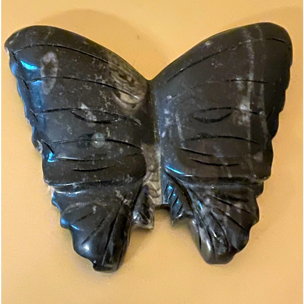 Carved stone butterfly